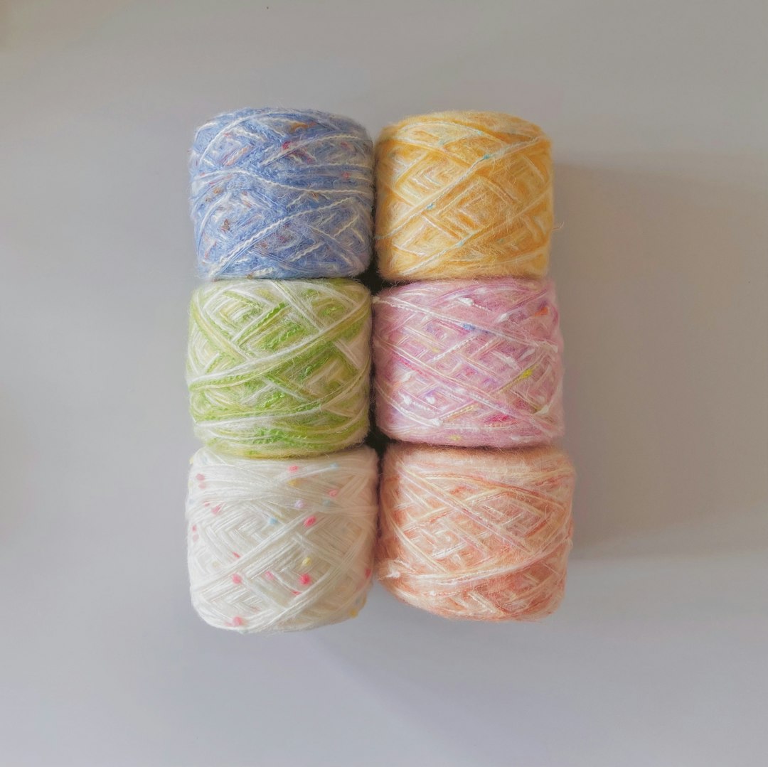 Colorful yarn skeins for crochet bandana projects